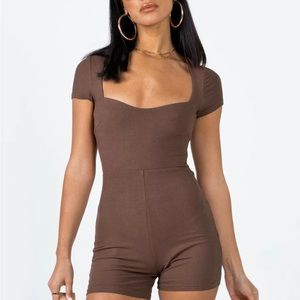 Brand new/ never worn Princess Polly Romper . Size 4